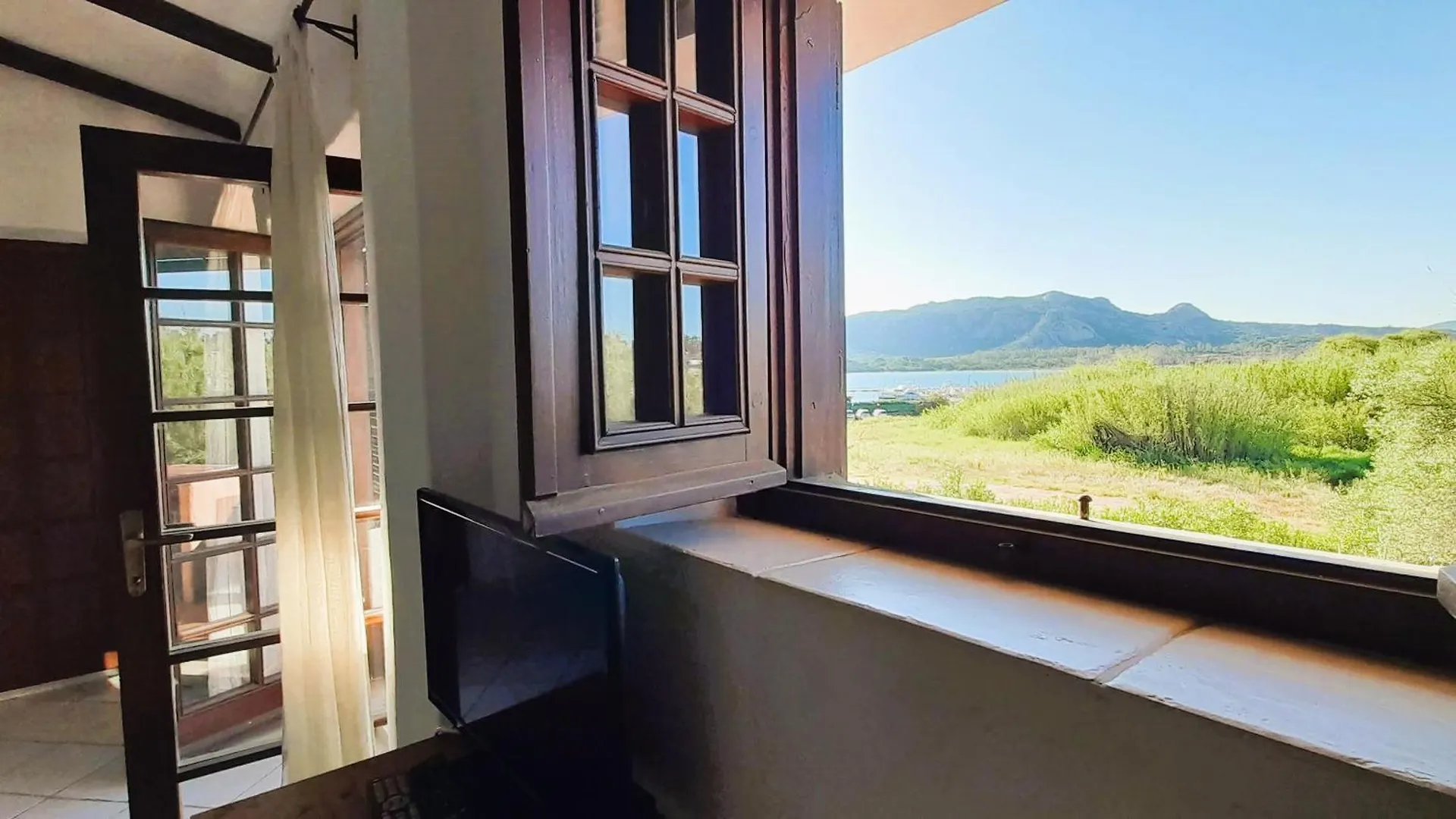 I Nuraghi Apartments Канниджионе